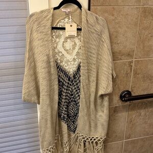 Poncho style cardigan sweater by Blu Pepper NWT Khaki color, size L, fringe trim